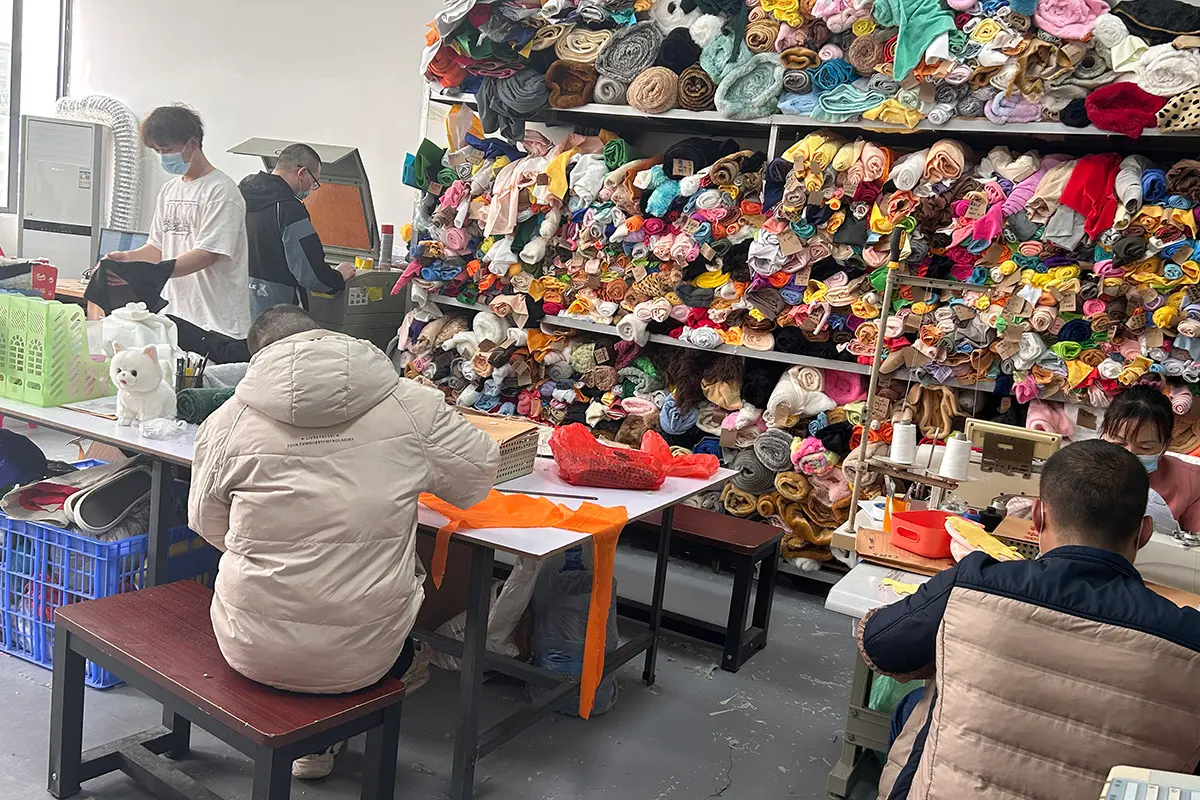 WisePlush sample making room with fabric swatches and plush samples in review
