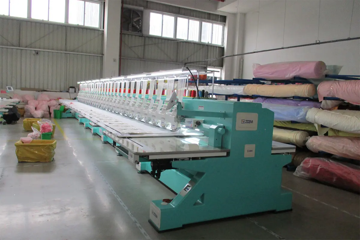 Embroidery machines used for custom plush faces logos and stitched details
