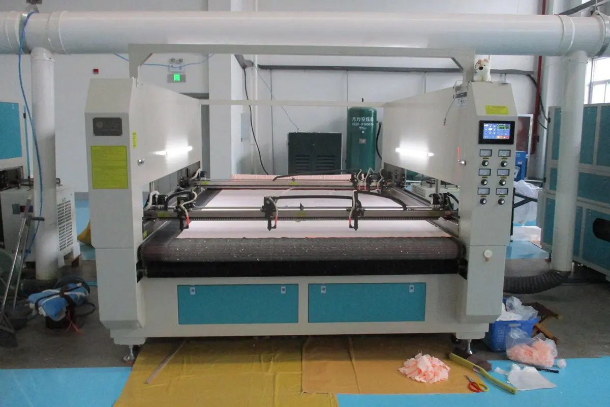 Pattern cutting equipment used after custom plush artwork is converted into production pieces