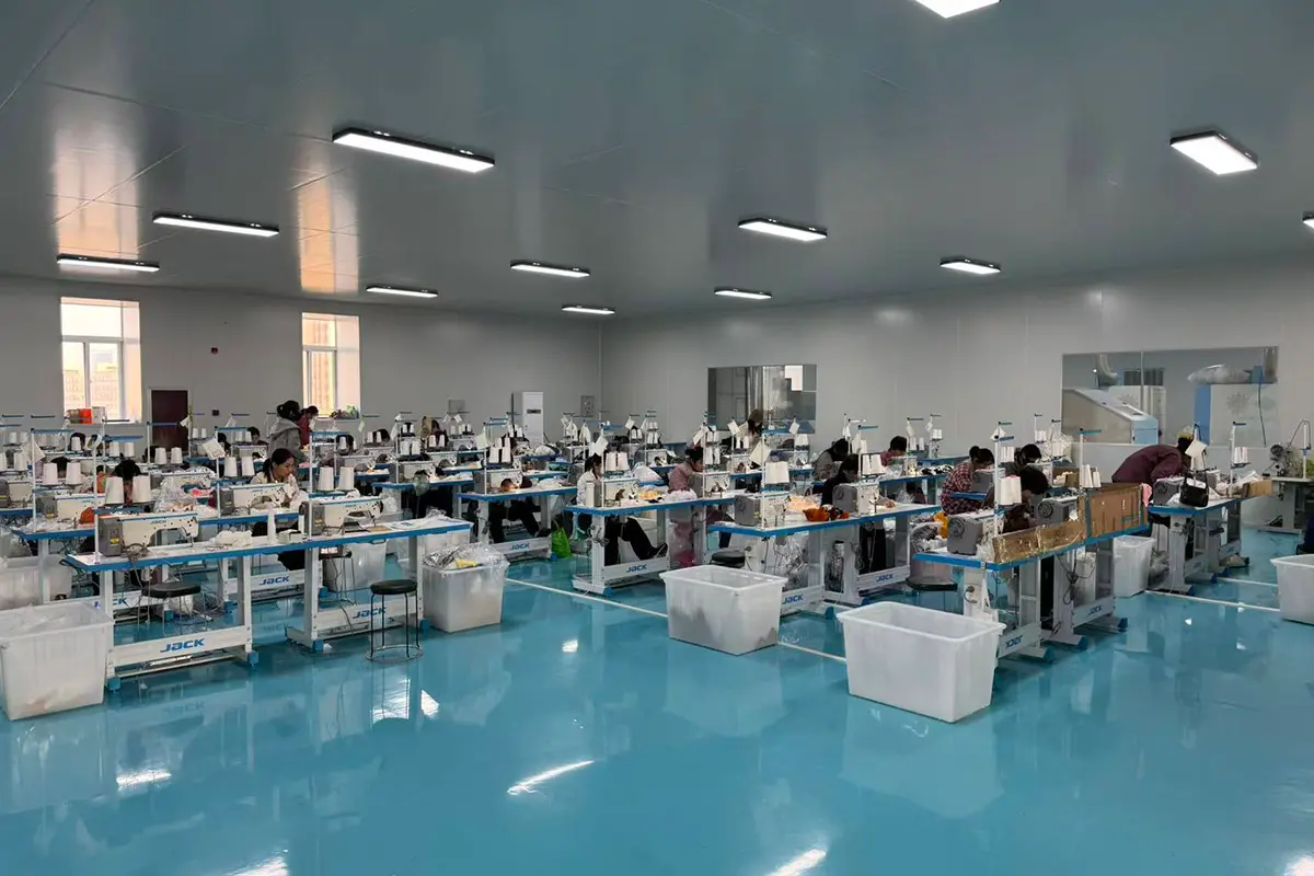 Custom plush sewing workshop with production workstations