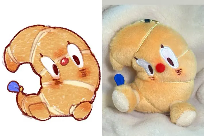 croissant shaped plush sample beside sketch reference