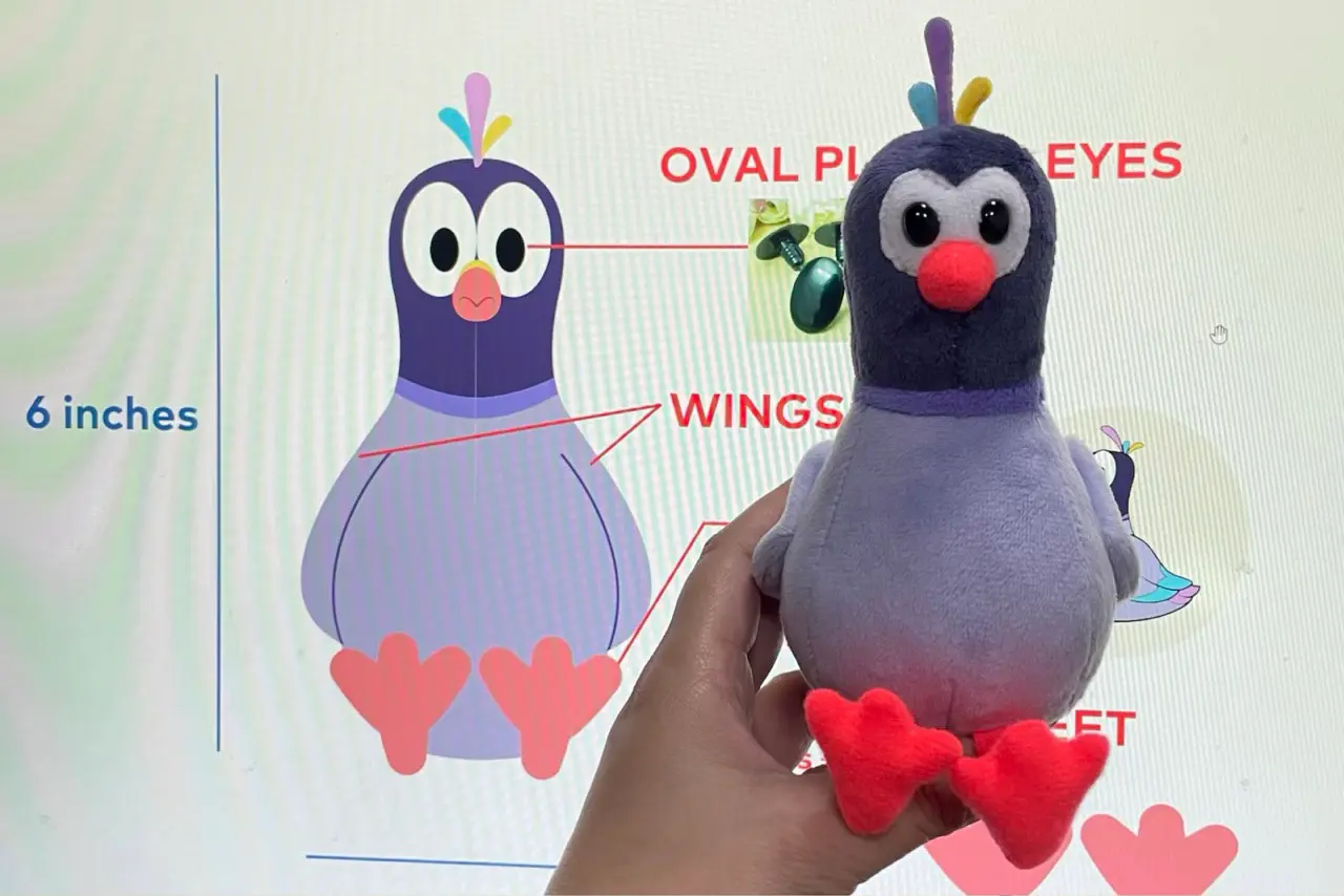 small purple bird plush sample with oval plastic eyes and red feet