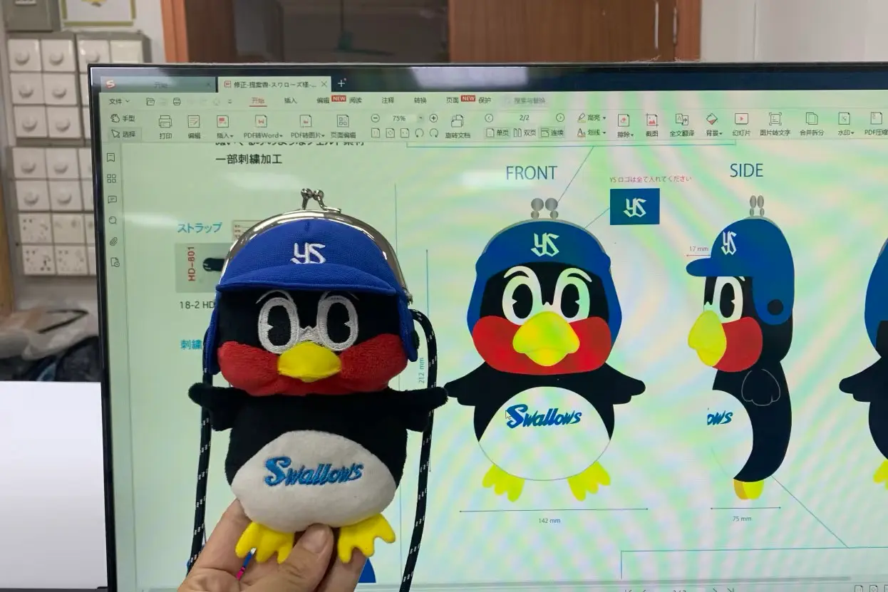 Penguin mascot character plush sample compared with front and side artwork