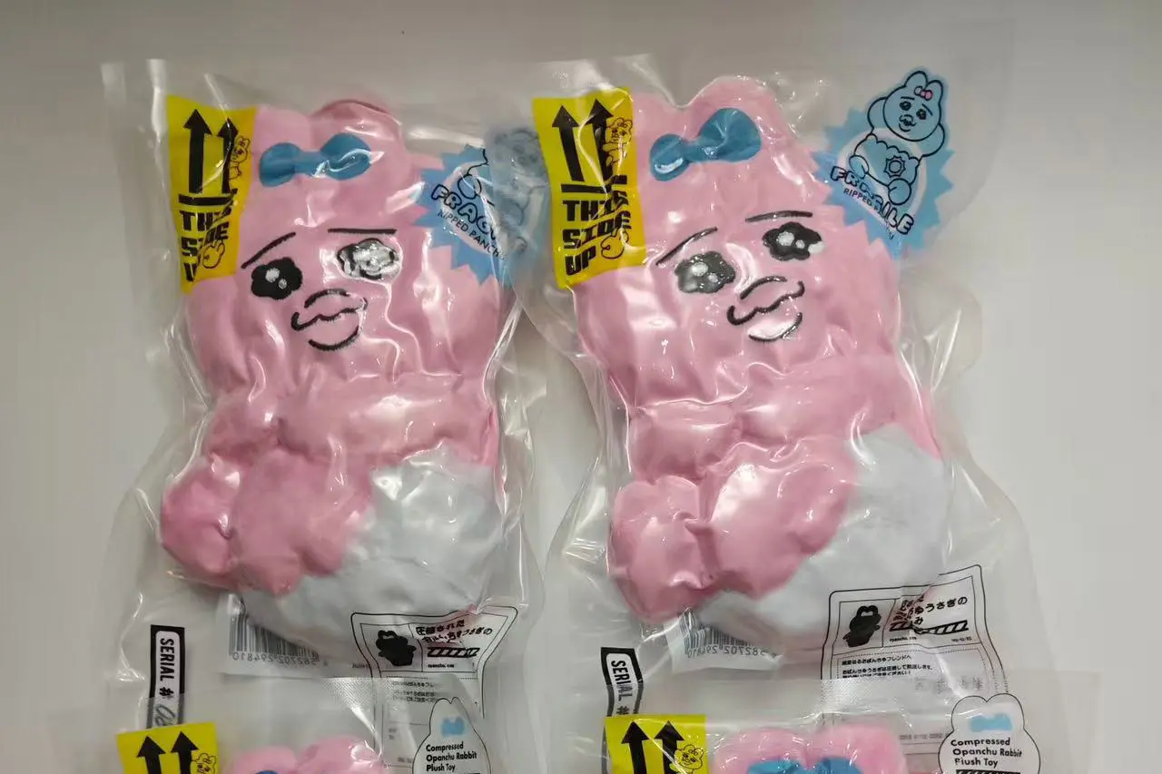 Compressed pink plush bags in vacuum packs showing shape and packing risk