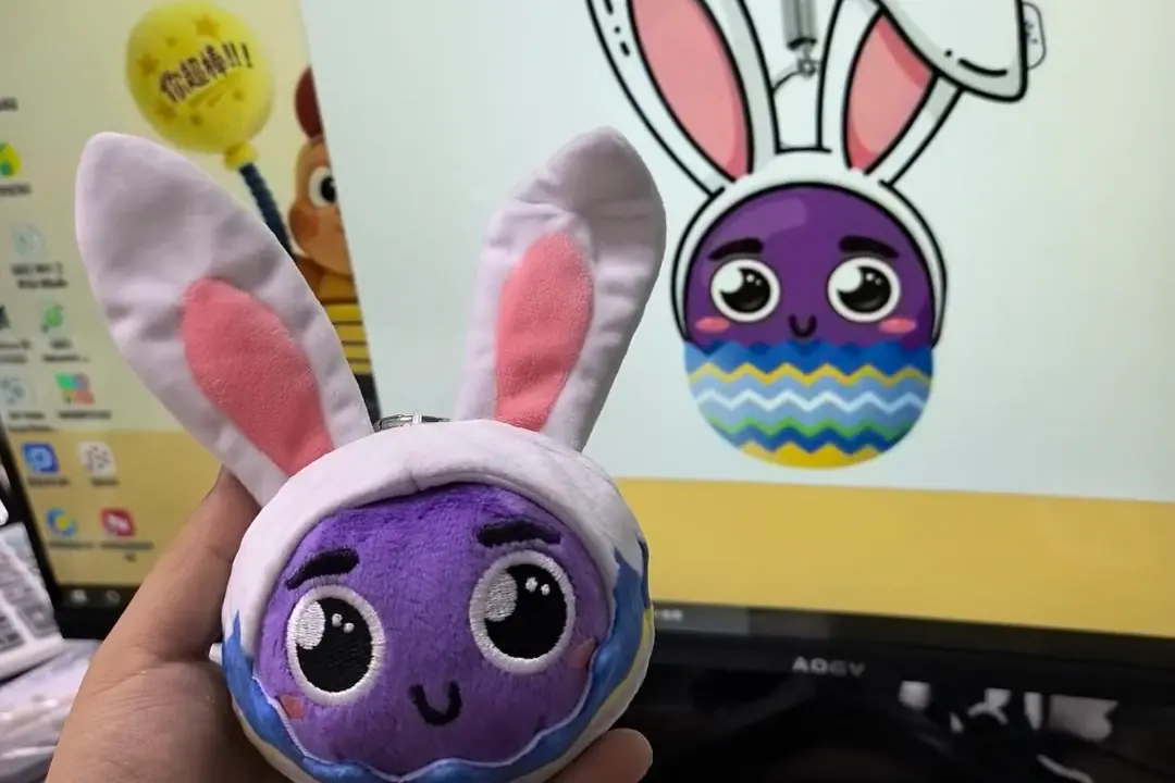 Bunny ear egg character plush sample matched against the screen artwork