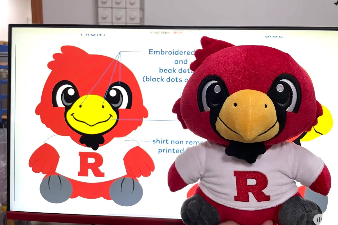 Red bird mascot artwork turned into an embroidered custom plush sample