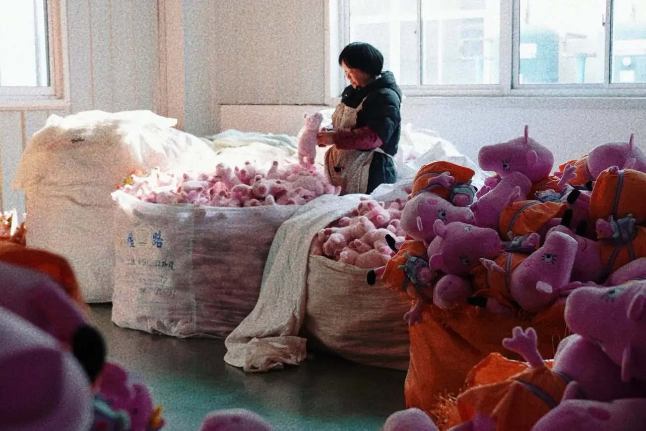 Pink plush toys being bagged and sorted before shipment preparation