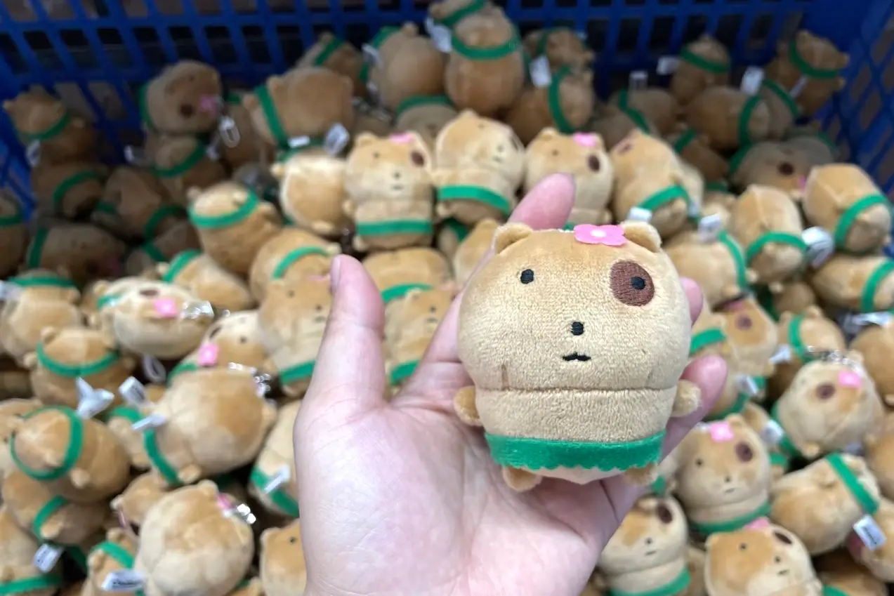 Small plush samples in a production basket during final sample review