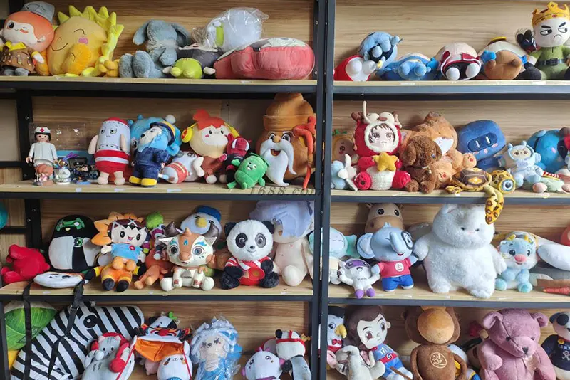 Custom anime plush samples with artwork references