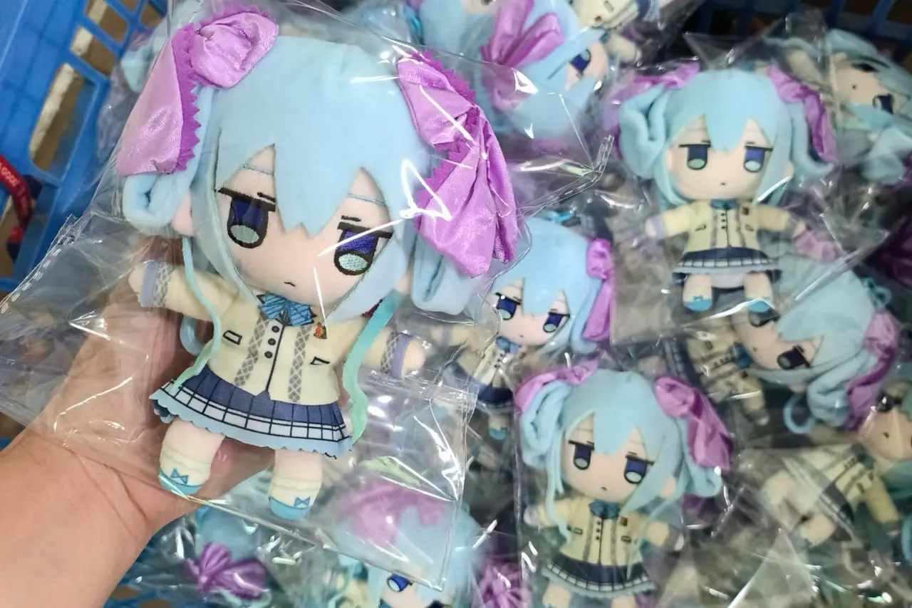Packaged anime plush dolls in clear bags for custom plush toy orders
